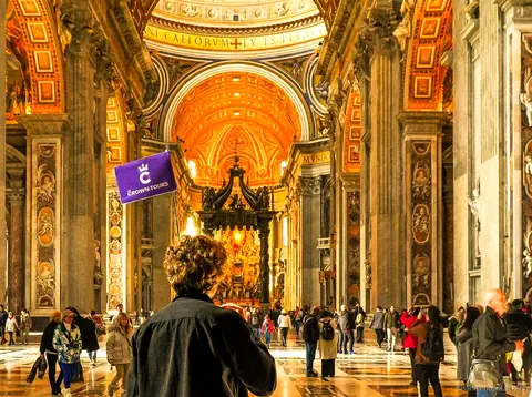 Guide leading a small group on a Vatican Museums and Sistine Chapel tour